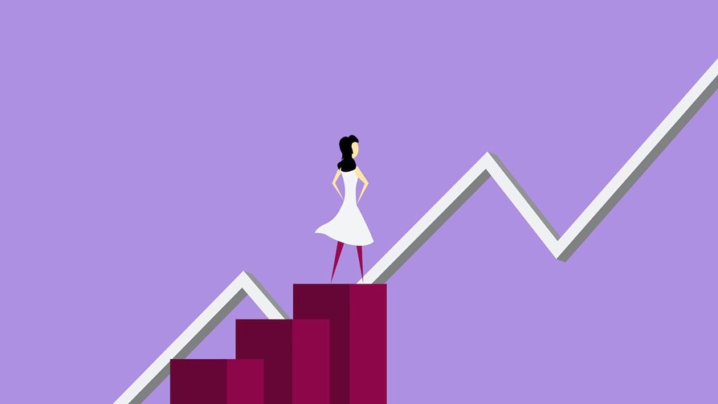 Graphic of a woman in a white dress, standing at the top of three blocks, looking at a line graph zig zagging with an upward trend. Symbolizes the positive job market trend for dental hygienists.